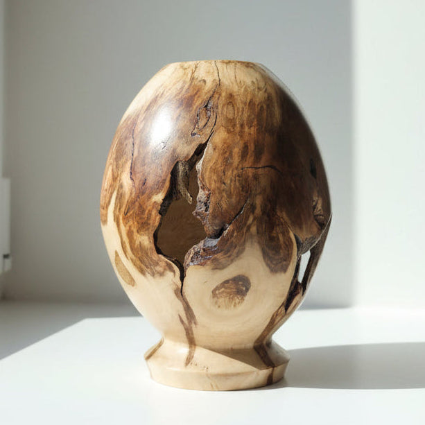 Wooden vase with natural pattern