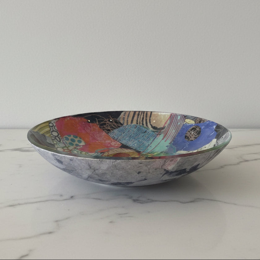 Decorative round bowl with a colorful design