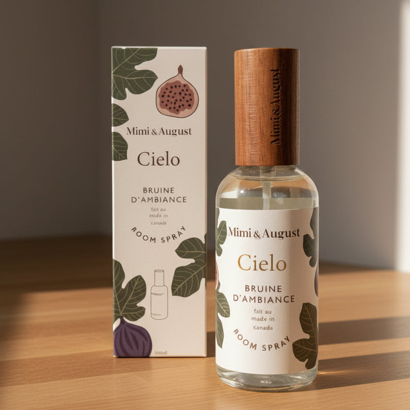 A room spray bottle with a wooden cap.