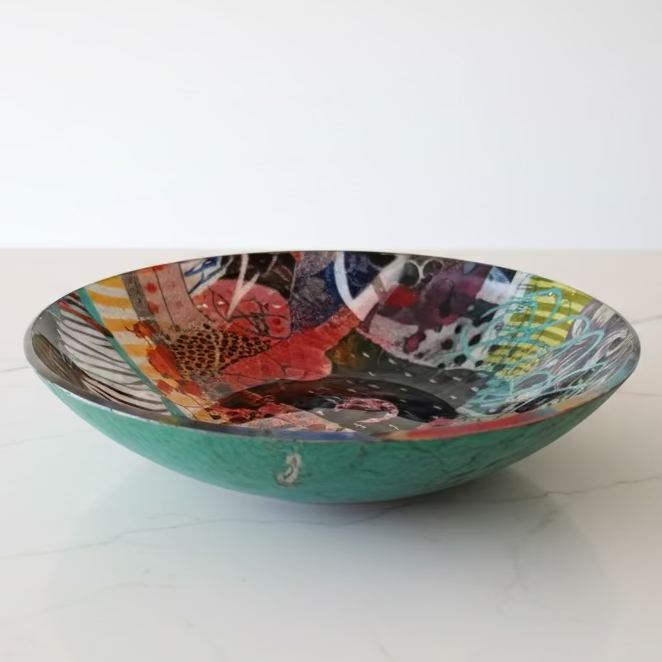 Decorative glass bowl with artistic design