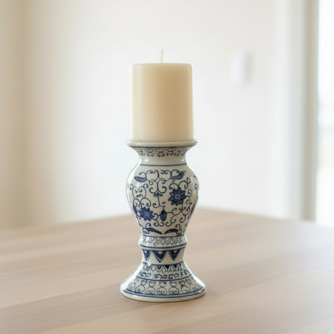 A decorative blue and white porcelain candle holder