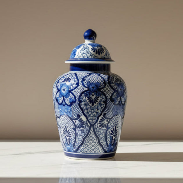 A blue and white patterned ceramic jar with a matching lid.
