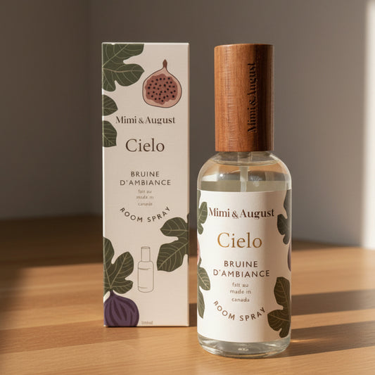 A room spray bottle with a wooden cap.