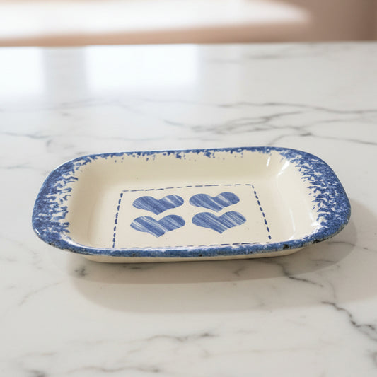 Small ceramic dish with painted hearts and spongeware boarder