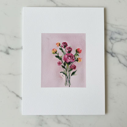 Artwork featuring a watercolor bouquet of pink and orange flowers with green stems on a light pink background